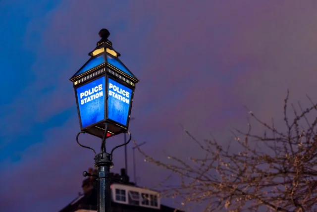 blue police station lamp in the UK, representing Report Fraud, the service that replaced Action Fraud