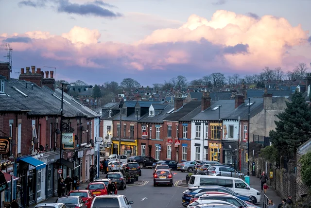 cars parked along a UK terraced street where council parking rules apply