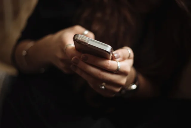 late-night messages on a phone, how romance scammers build trust before asking for money