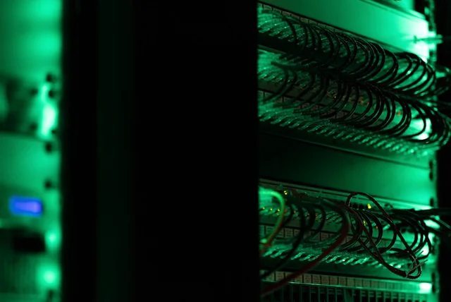server racks representing scam websites taken down after email reports