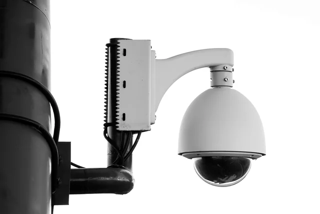 Security camera on a post representing privacy concerns about uk digital id