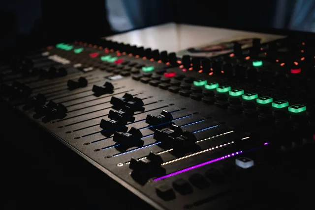 audio equipment representing AI voice cloning used in hi mum scam voice notes